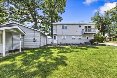 Wake up to beautiful views of Houghton Lake from the spacious - photo 30