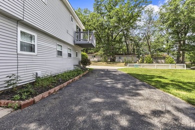 Wake up to beautiful views of Houghton Lake from the spacious - photo 35