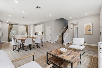 The open-concept floor plan showcases impressive 10-foot - photo 12