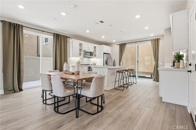 The open-concept floor plan showcases impressive 10-foot - photo 13