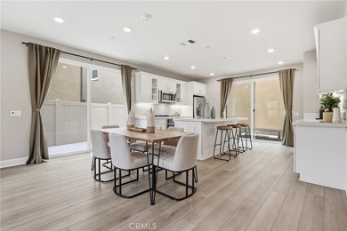 The open-concept floor plan showcases impressive 10-foot - photo 15