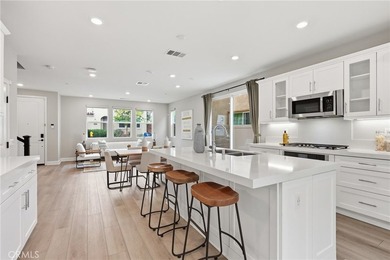 The open-concept floor plan showcases impressive 10-foot - photo 16