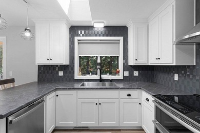 Set in the Purves Lagoon neighborhood, this remodeled - photo 18
