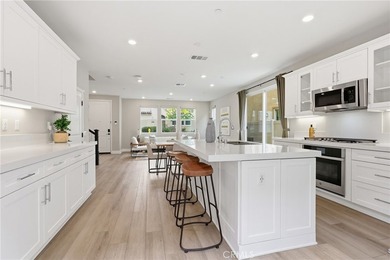 The open-concept floor plan showcases impressive 10-foot - photo 19