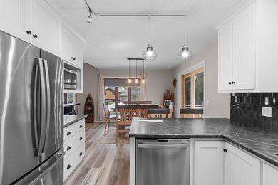 Set in the Purves Lagoon neighborhood, this remodeled - photo 19