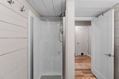 Set in the Purves Lagoon neighborhood, this remodeled - photo 32
