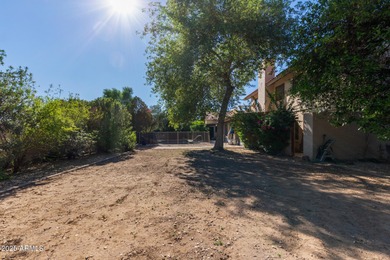 One of the few homes in the neighborhood on a double lot, this