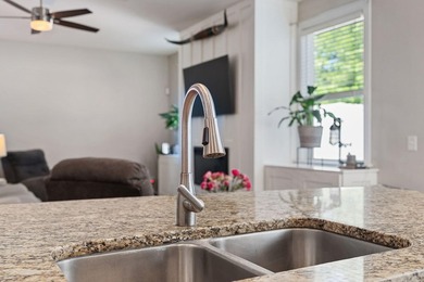 Located in desired Bolton's Landing, this 4BR/3.5BA where the - photo 9