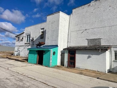 This is a great investment opportunity right on the river. The - photo 2