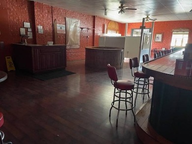 This is a great investment opportunity right on the river. The - photo 8