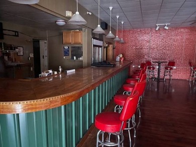 This is a great investment opportunity right on the river. The - photo 10