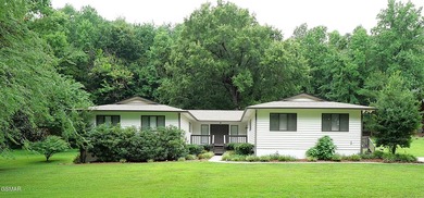 Located within the picturesque lakefront community that offers a - photo 1