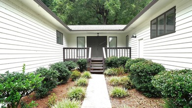 Located within the picturesque lakefront community that offers a - photo 2