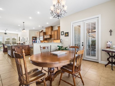 This sprawling one-story custom stone home sits on 4.33 acres of