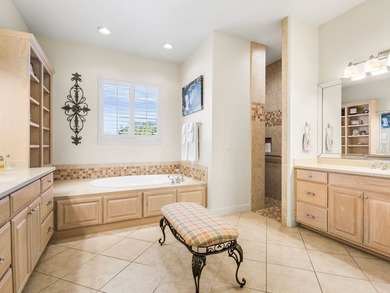 This sprawling one-story custom stone home sits on 4.33 acres of