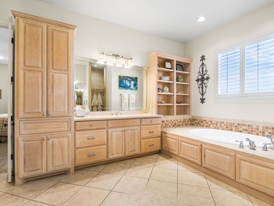 This sprawling one-story custom stone home sits on 4.33 acres of