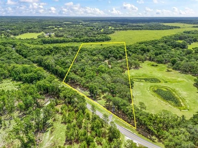 Tucked away behind a beautiful board-fenced entrance and paved - photo 2