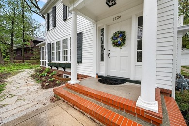 Set on a mature lot in sought-after Shorewood Hills, this - photo 2