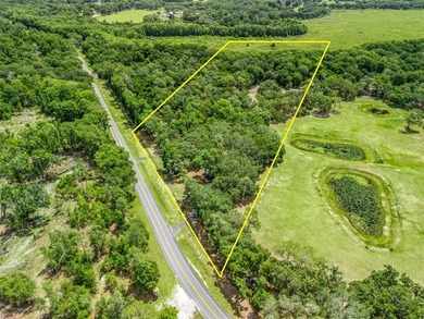 Tucked away behind a beautiful board-fenced entrance and paved - photo 3