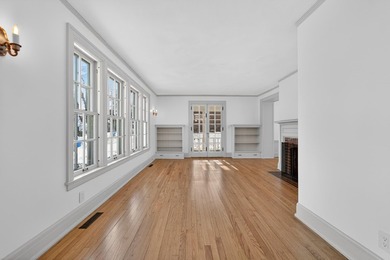 Set on a mature lot in sought-after Shorewood Hills, this - photo 3