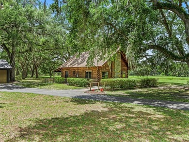 Tucked away behind a beautiful board-fenced entrance and paved - photo 7