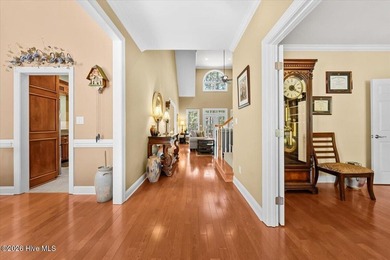 Nestled on a beautifully landscaped 0.70-acre golf-front lot - photo 11