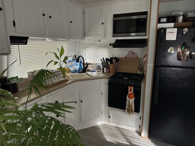 Charming 2010 Nomad camper with large deck on leased land with - photo 6