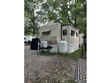 Charming 2010 Nomad camper with large deck on leased land with - photo 9