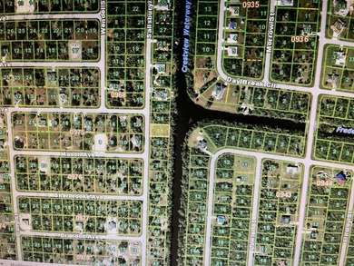 Beautiful lot in the water (canal) with newer homes around - photo 3
