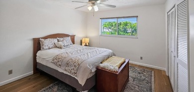 This quaint 55+ condo features white oak engineered hardwood - photo 3
