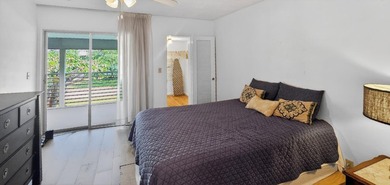 This quaint 55+ condo features white oak engineered hardwood - photo 5
