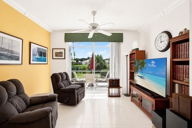 Enjoy peaceful lake views from this well-maintained villa in the - photo 13