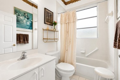 Enjoy peaceful lake views from this well-maintained villa in the - photo 19