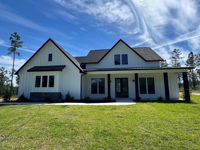 Exquisite modern new construction offering 1,755 sq ft of - photo 3