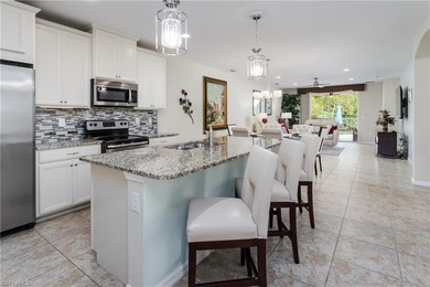 WELCOME TO THE AMENITY RICH COMMUNITY OF NAPLES RESERVE! THIS - photo 1