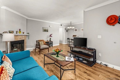 Location! Location, Location! This top-floor 3rd-story condo is - photo 2