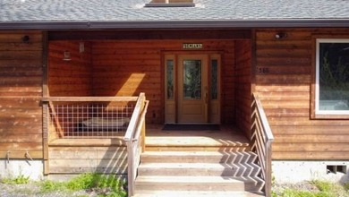 Experience the rare opportunity to own a custom riverfront - photo 3