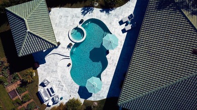 Situated on a rare .60-acre corner lot within the coveted - photo 4