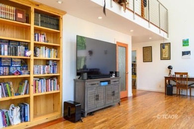 Experience the rare opportunity to own a custom riverfront - photo 6