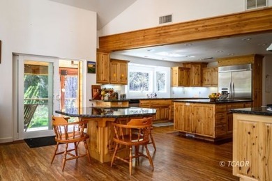 Experience the rare opportunity to own a custom riverfront - photo 8