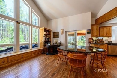 Experience the rare opportunity to own a custom riverfront - photo 10