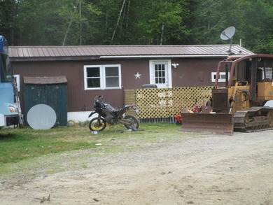Gorgeous 70 feet of lawn on Cold Stream Pond with two acres of - photo 11