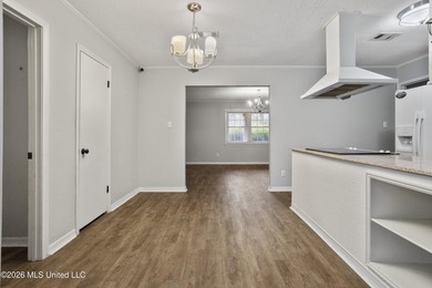 This charming home features a fenced backyard with a saltwater - photo 12
