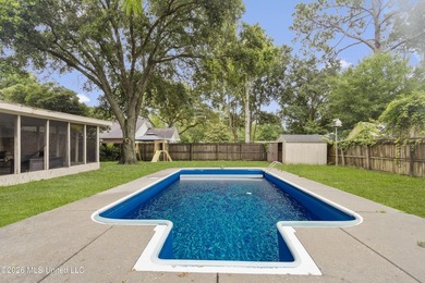 This charming home features a fenced backyard with a saltwater - photo 23