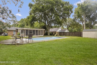 This charming home features a fenced backyard with a saltwater - photo 24