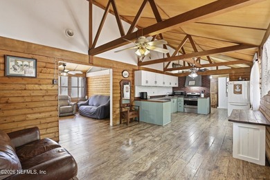 Adorable home with rustic farmhouse flair nestled on just over - photo 11