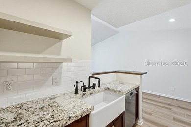 Extensively renovated in 2023, this second-floor end unit offers - photo 13