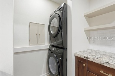 Extensively renovated in 2023, this second-floor end unit offers - photo 15