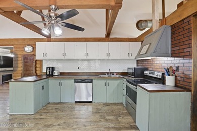 Adorable home with rustic farmhouse flair nestled on just over - photo 15