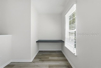 Extensively renovated in 2023, this second-floor end unit offers - photo 24